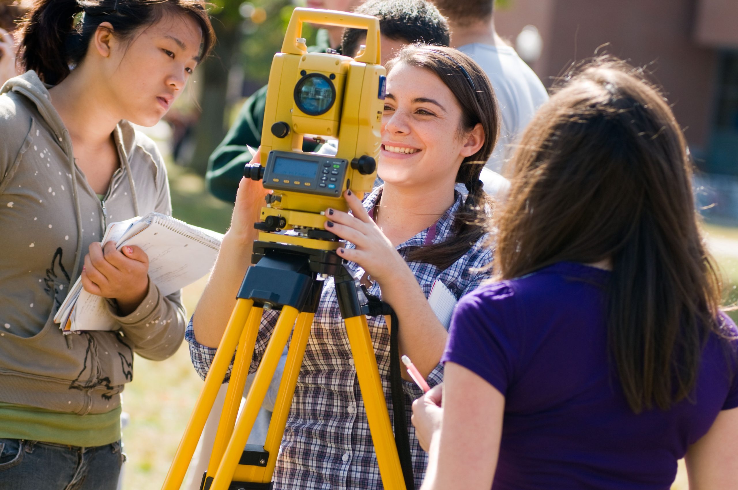 Students engaged in a Surveying class outside the Student Union Mall.